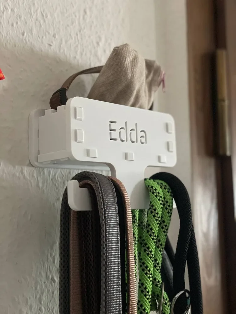 Cabide de parede para trelas