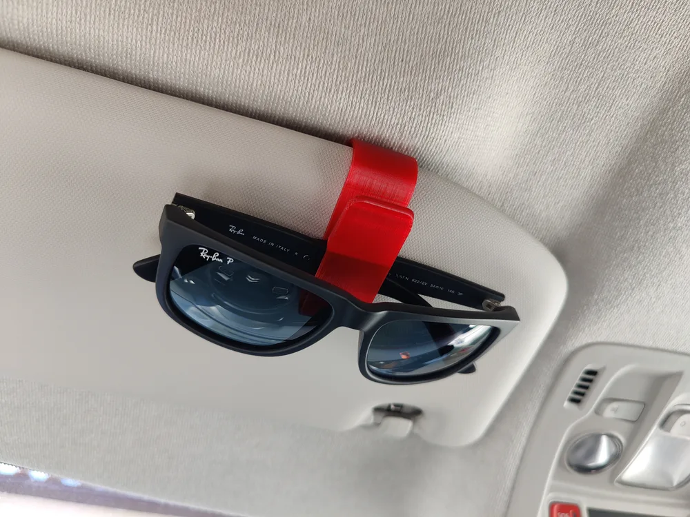 Mola de óculos de sol para o carro