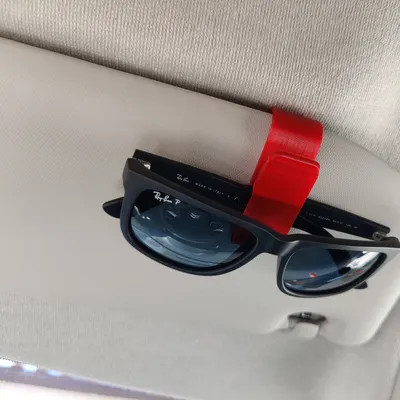 Mola de óculos de sol para o carro