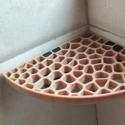 Prateleira de canto para o duche